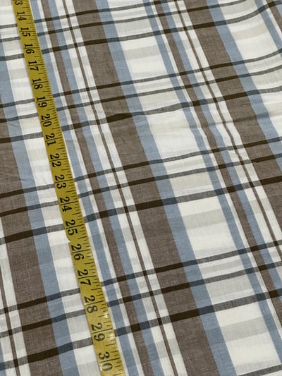 Off-white, brown and sky blue plain plaid yarn-dyed fabric.
