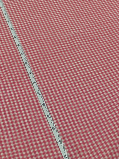 Pink and white plain gingham checks yarn-dyed fabric.