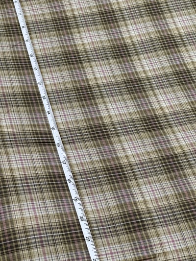 Light brown, grey and off-white plaid yarn-dyed fabric, with thin pink lines.