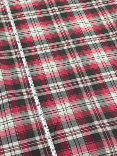 Pink, grey and white plaid yarn-dyed fabric, with pink and grey crossing bands.