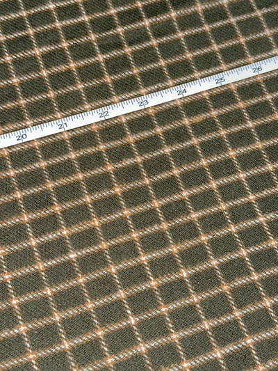 Olive, mustard and white windowpane flannel check yarn-dyed fabric.