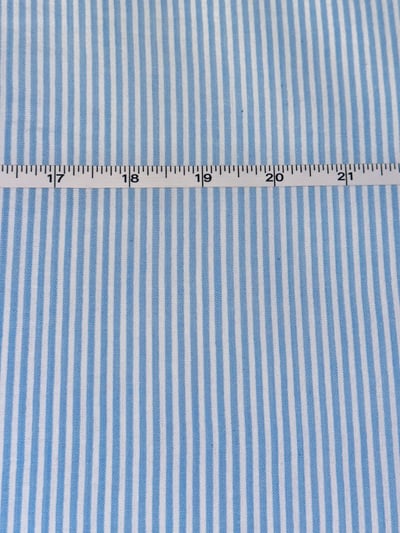 Sky blue and white seersucker candy stripe yarn-dyed fabric.
