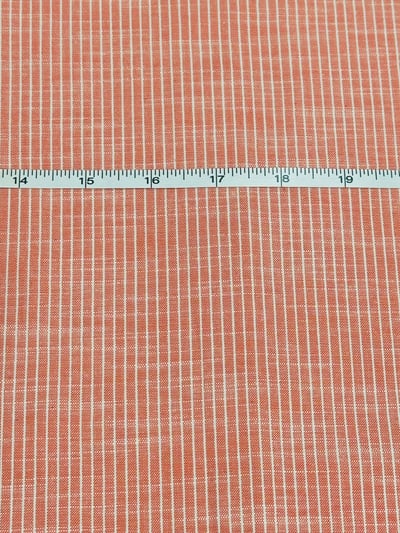 Brick red and white slub pinstripe yarn-dyed fabric, with a visible slub texture.
