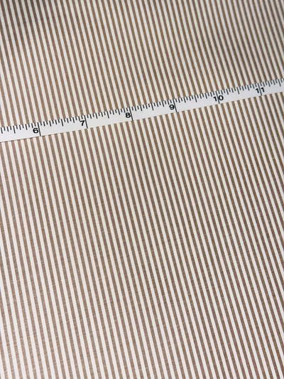 Brown and white candy stripe yarn-dyed fabric.