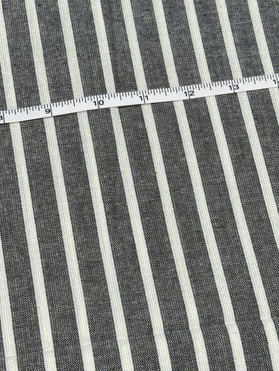 Black chambray and white multi stripe yarn-dyed fabric, with narrow white stripes between wider charcoal bands.